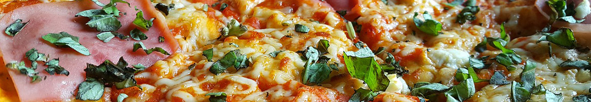 Eating Italian Pizza at Johnny G's Pizza Factory restaurant in Seaside Heights, NJ.